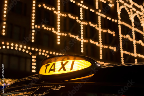 Photography Taxi in London in front of a shopping center