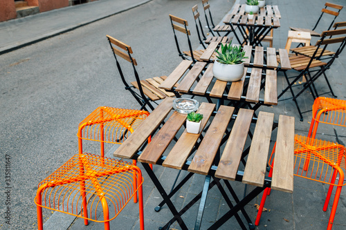 Canvas Print Empty restaurant terrace with tables and chairs in Budapest, Hungary