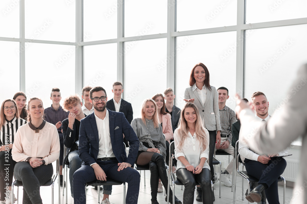 Naklejka premium image of a speaker giving a lecture at a business seminar