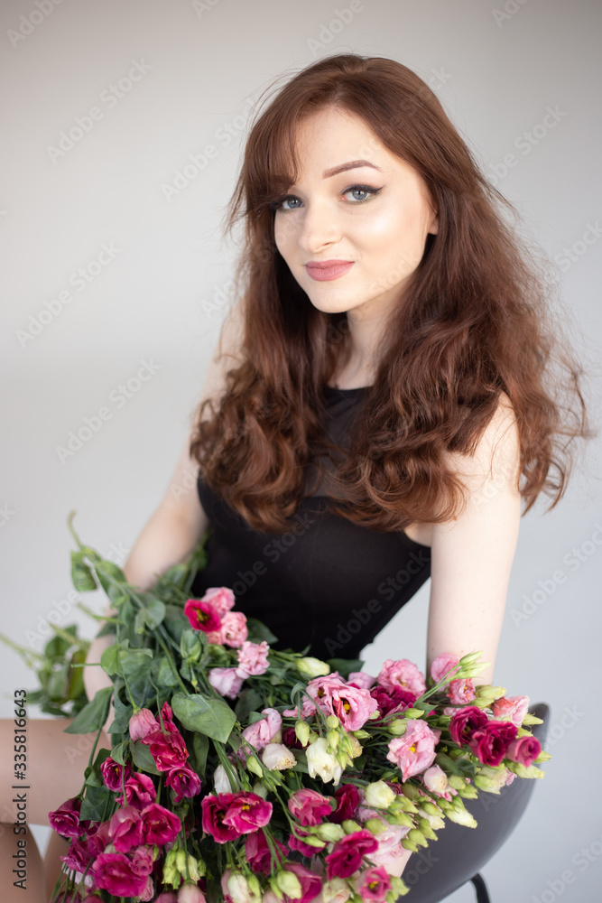 girl in black bodysuit with flowers girl in black bodysuit with flowers
