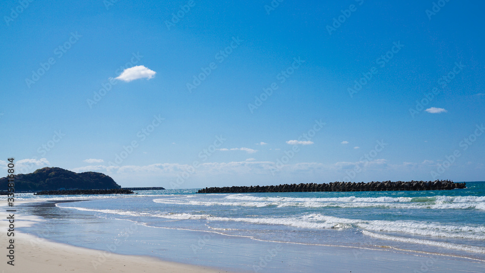 Obraz premium 海と空と砂浜の風景