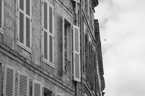 old building in La Rochelle, France, with windows