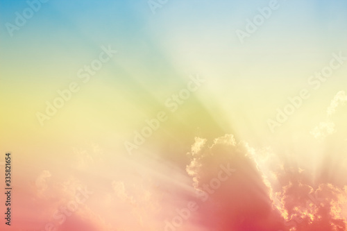 A soft fog cloug background with pastel colored orange to blue gradient
