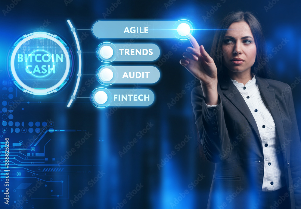 Business, Technology, Internet and network concept. Young businessman working on a virtual screen of the future and sees the inscription: Bitcoin cash Business, Technology, Internet and network concept. Young businessman working on a virtual screen of the future and sees the inscription: Bitcoin cash