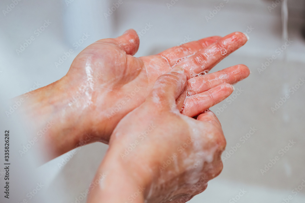 Close-up of washing hands with soap. Close-up of washing hands with soap.