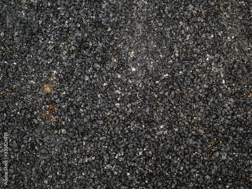 asphalt road texture background. black grit stone background