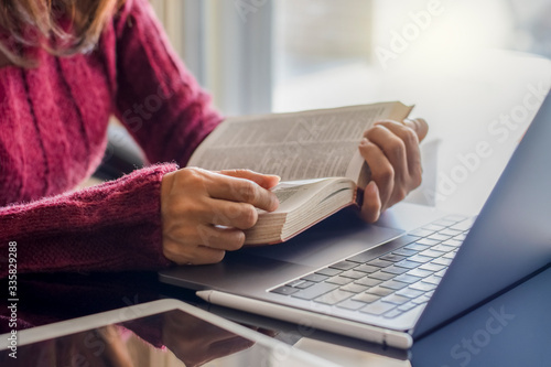 Woman read book at home.