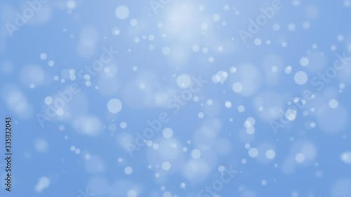 Beautiful animated light blue particle background with flickering bokeh particles.