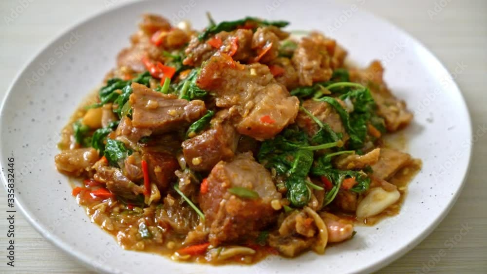 stir-fried crispy pork belly and basil - Asian local street food style stir-fried crispy pork belly and basil - Asian local street food style