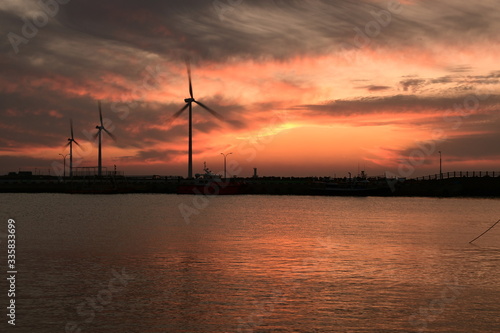 a windmill sea sunset © 성임 장