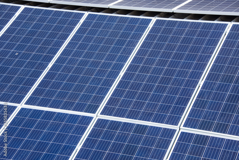 Detailed close-up of modern large photo voltaic solar panels. Solar cells panel Detailed close-up of modern large photo voltaic solar panels. Solar cells panel