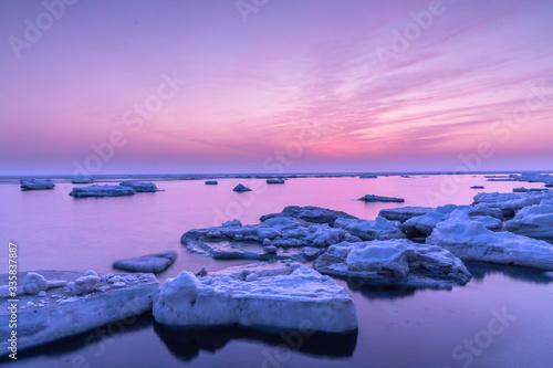 Drift ice in pink morning