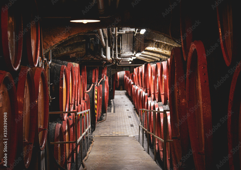 Liqure Unicum barrels in a cellar
