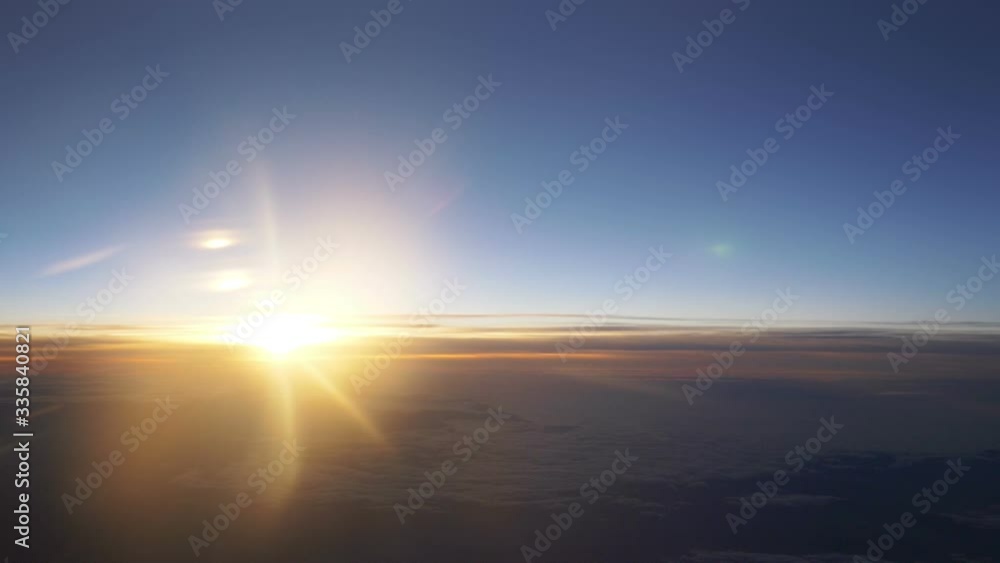 Aerial flight view at sunrise above clouds in slow motion 180fps Aerial flight view at sunrise above clouds in slow motion 180fps