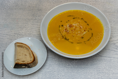 Spiced winter squash and coconut soup with bread