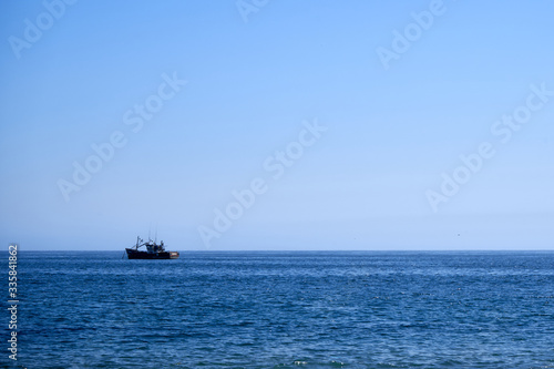 small boat in the ocean 