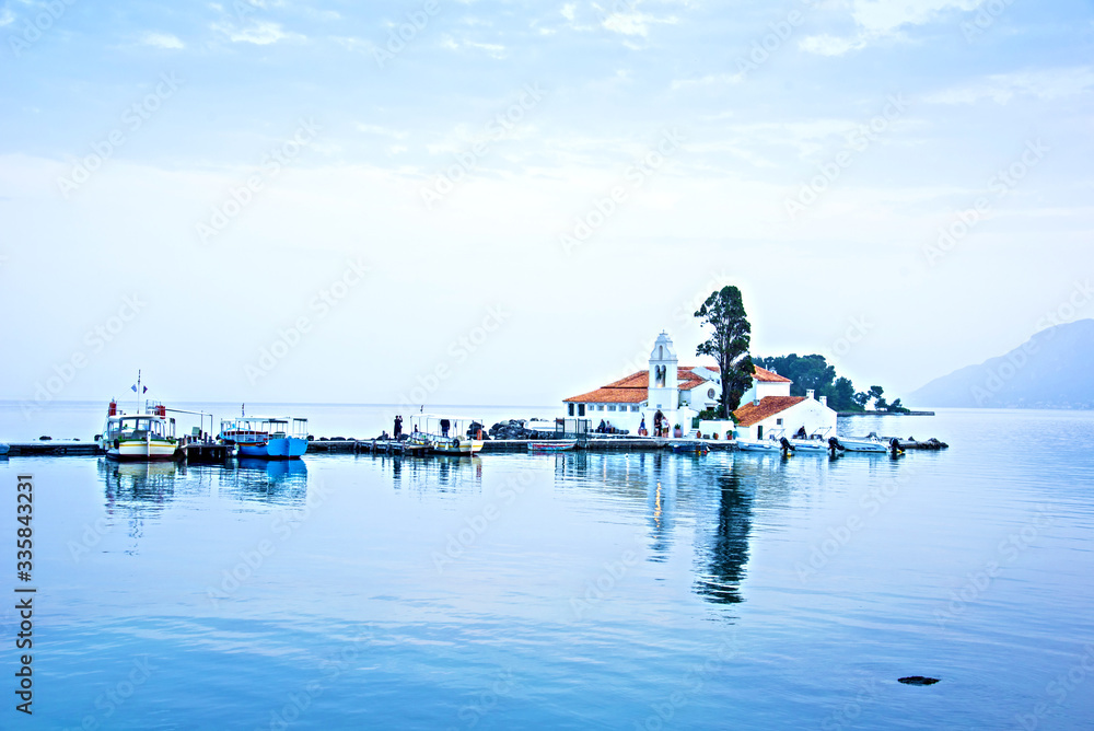 Nice optimistic view of Vlacherna Monastery on the Kanoni peninsula in Kerkyra, Corfu, Greece. popular tourist attractions. amazing places.