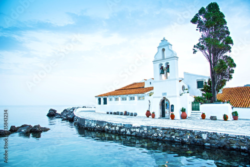 Obraz na płótnie Beautiful charming optimistic view of Vlacherna Monastery on the Kanoni peninsula in Kerkyra, Corfu, Greece. popular tourist attractions. amazing places. w salonie