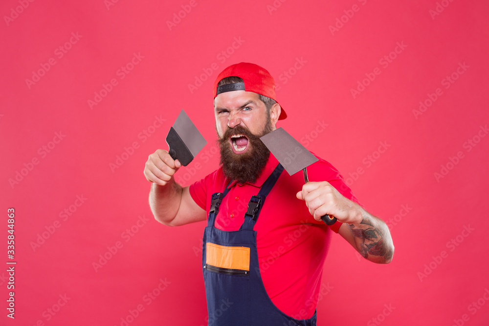 Busy working day. building is hobby. best service ever. repairman at his workshop. engineering. Tools for repair. Builder engineer architect. angry bearded safety expert. Build your future yourself
