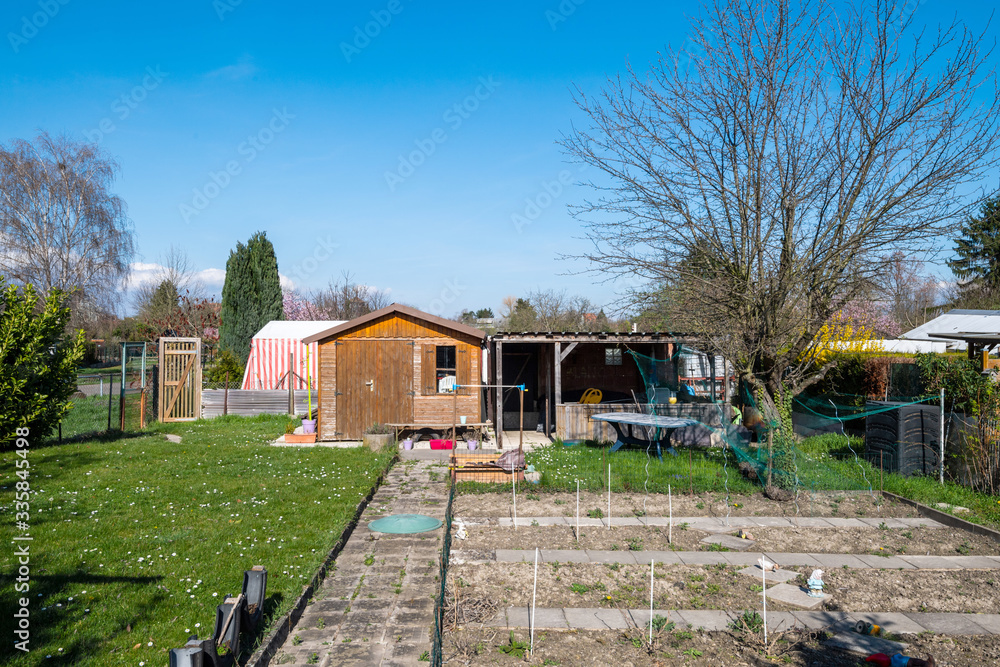 Empty garden allotment with prepared plowed soil for the spring cultures - hobby agriculture