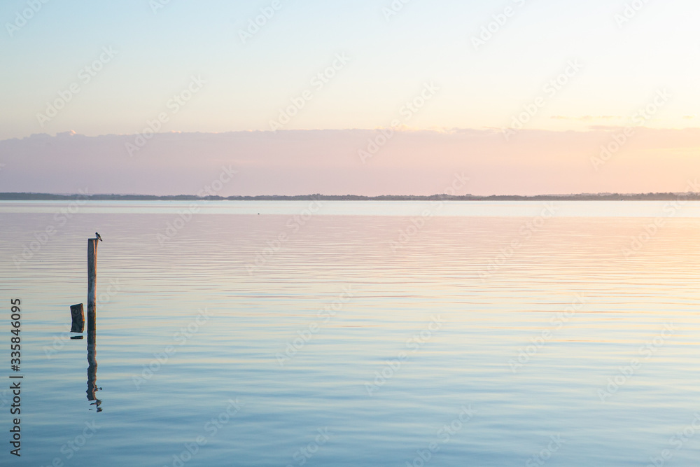 Sunrise reflections at Bacalar Lake in Quintana Roo, Mexico Sunrise reflections at Bacalar Lake in Quintana Roo, Mexico