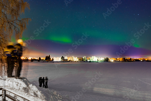 Tourists admiring the Northen Lights in Lapland, Finland