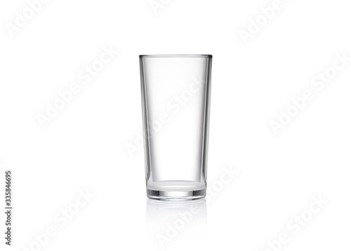 Glass cup isolate closeup. Glass on a mirror surface. Empty glass of glass on a white background.