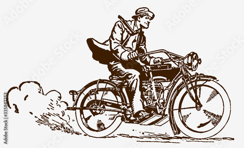Fototapeta Naklejka Na Ścianę i Meble -  Man riding an antique motorcycle at high speed. Illustration after engraving from early 20th century