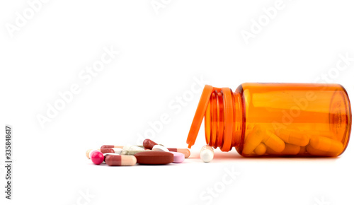 medicine bottle and pills