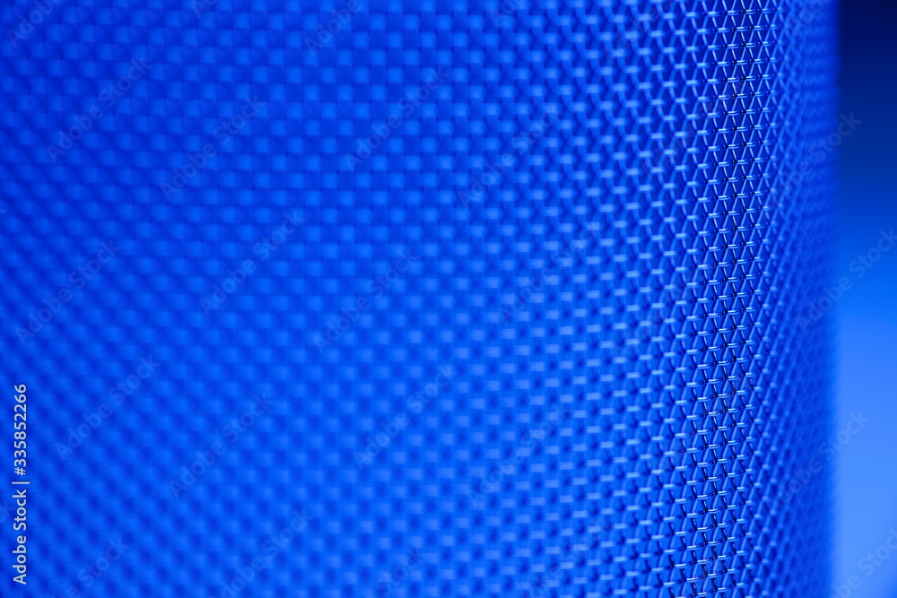Close-up of a mesh of a sieve in blue Close-up of a mesh of a sieve in blue