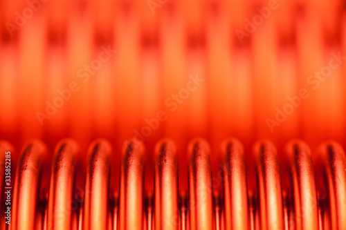 Detail of a hot heat exchanger or recuperator in orange red photo