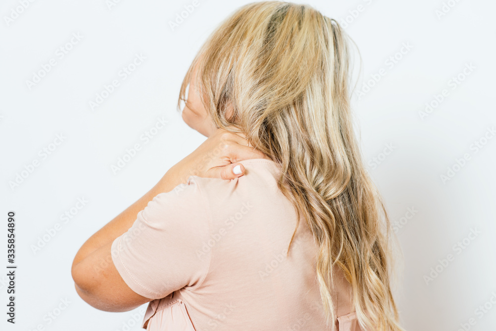 Close Up portrait stressed unhappy, young pretty woman with bad chronic neck pain, muscle sprain after long hours work, studying Close Up portrait stressed unhappy, young pretty woman with bad chronic neck pain, muscle sprain after long hours work, studying