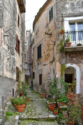 Fototapeta Naklejka Na Ścianę i Meble -  A narrow street in a small village in central Italy