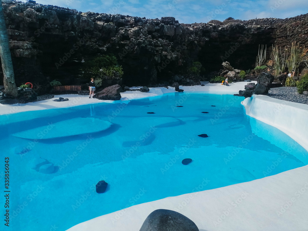 artificial pool, surrounded by greenery, in the canary islands