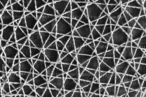wicker mesh texture background. Black and white photo