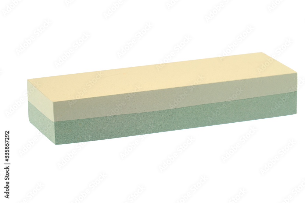 close up on whetstone isolated on white background close up on whetstone isolated on white background