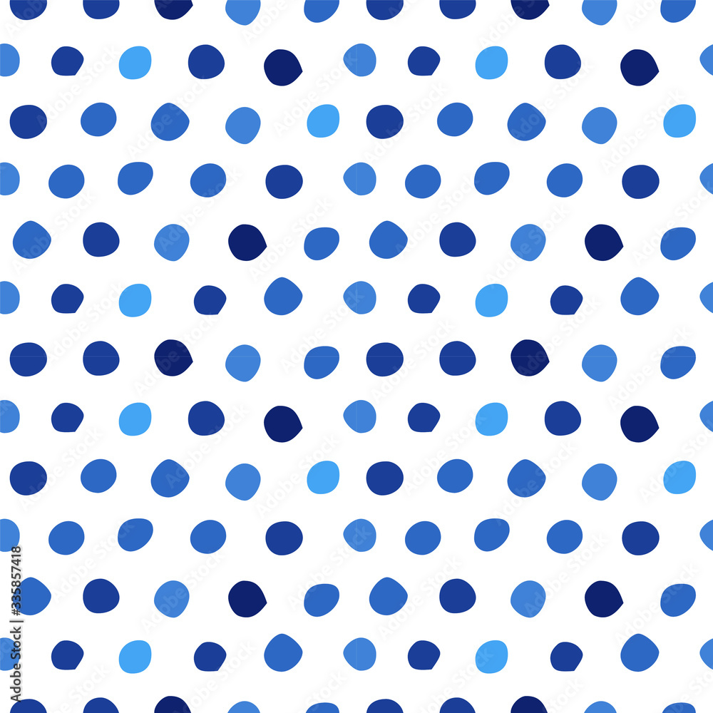 Seamless pattern with blue polka dots of different shades/ Hand drawn design element/ Abstract background