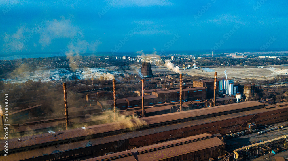 Fototapeta premium metallurgical production plant full cycle smoke from pipes bad ecology aerial photography