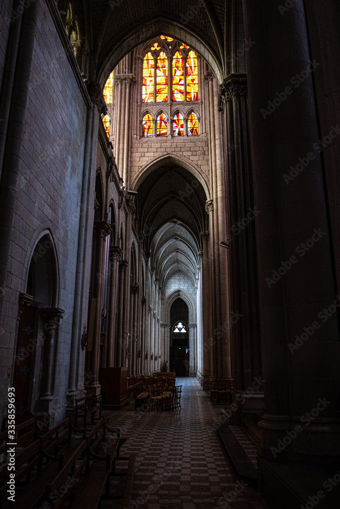 Fototapeta premium Photography of Cholet's Cathedral side aisle. Side aisle of a Cathedral in France, 2020.