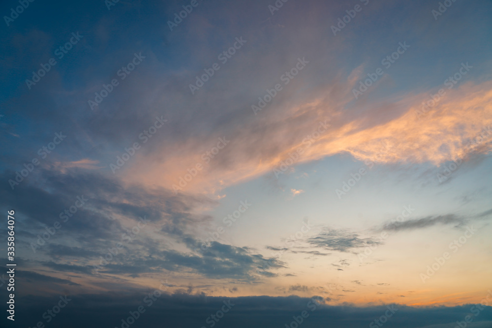 Background of colorful sky concept, Dramatic sunset with twilight color sky and clouds.