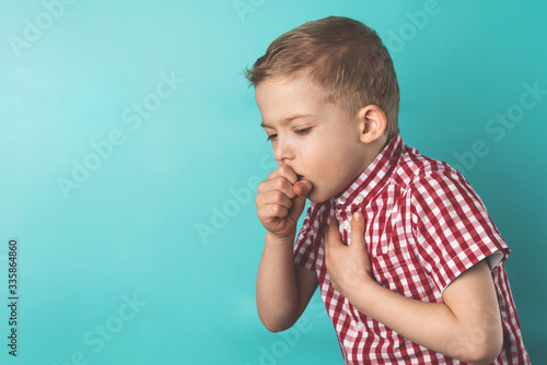 child got sick with a virus. the little boy coughs. coronavirus is dangerous for children