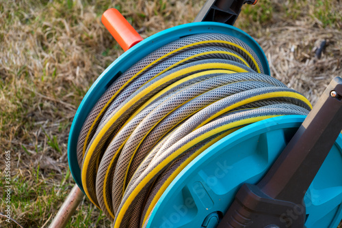 Close-up of garden hose reel for irrigation
