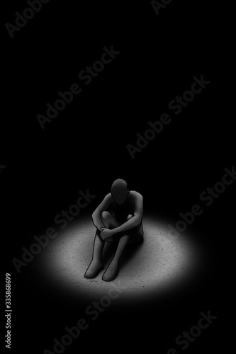 Cuadro en lienzo Person sitting alone in isolation feeling despressed in the dark with a spotligh