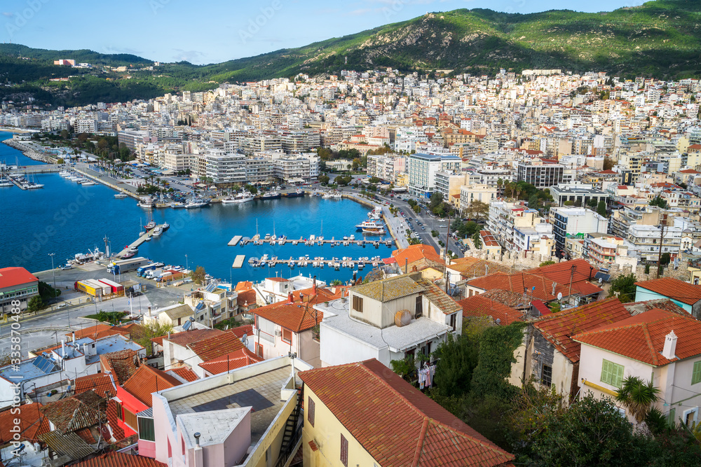 Aerial panoramic view with the city of Kavala in northern Greece with marina and seafront promenade