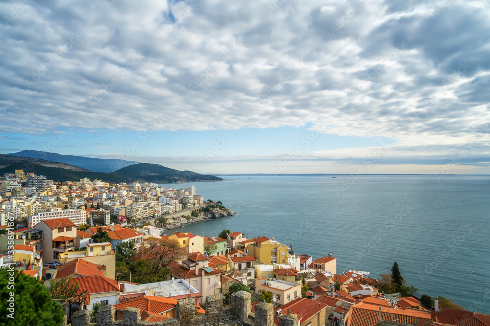 Aerial view with the city of Kavala in northern Greece, surrounded by turqoise sea Aerial view with the city of Kavala in northern Greece, surrounded by turqoise sea