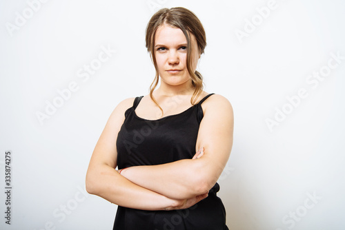 Portrait of a woman arms folded