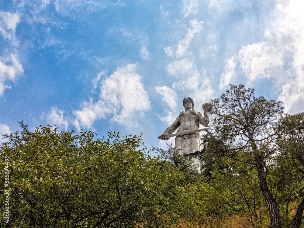 Fototapeta premium Kartli's mother towers over Tbilisi on Sololaki mountain range