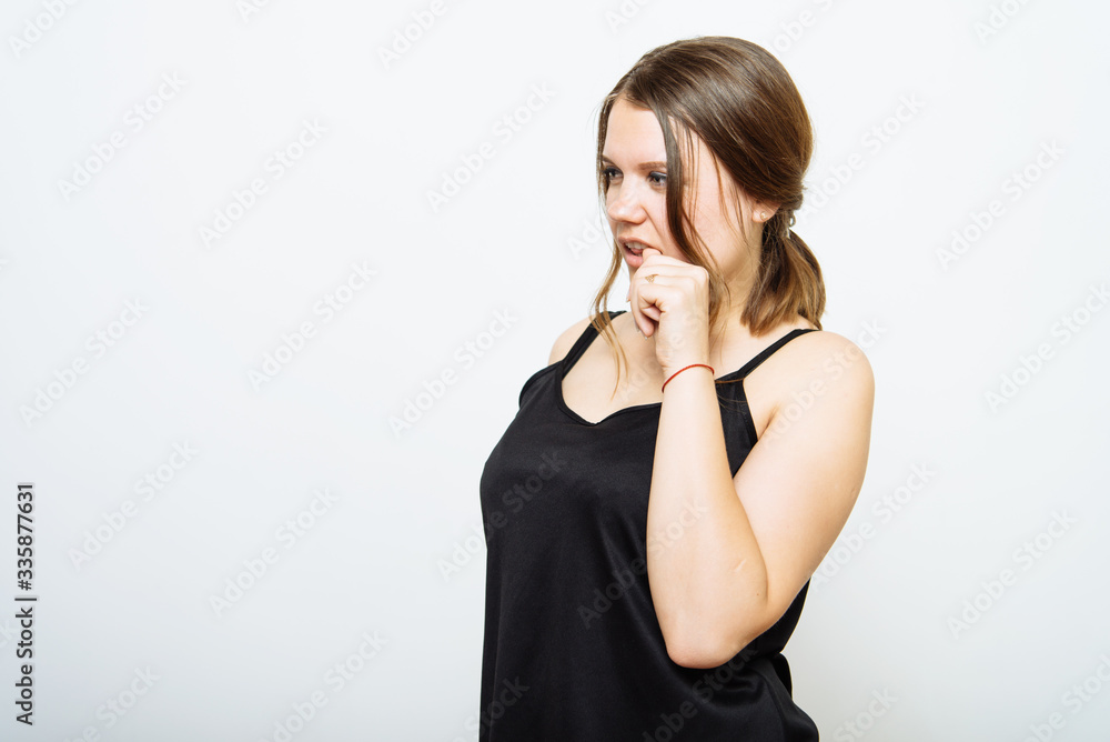 Woman bites his nails Woman bites his nails