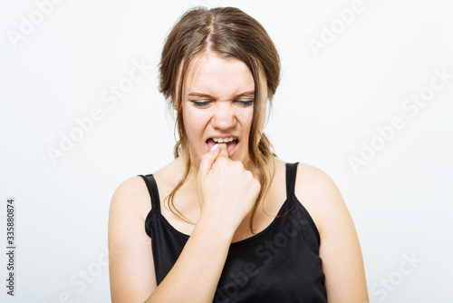 Girl nausea finger in mouth
