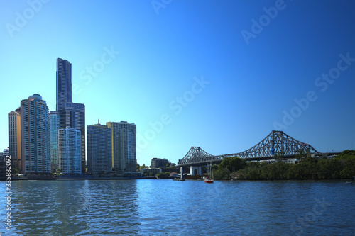 Story bridge and skyscrapers under blue skies in Brisbane, Australia © Ines Porada